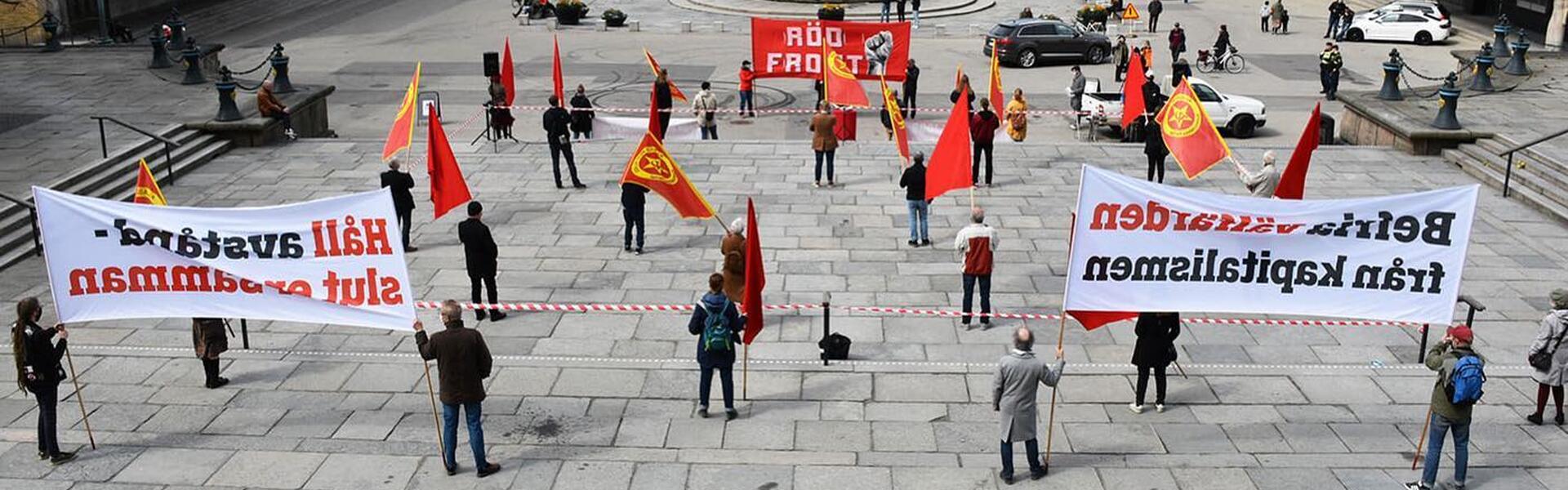 Bild på demonstranter vid Kommunisterna första maj firande 2021
