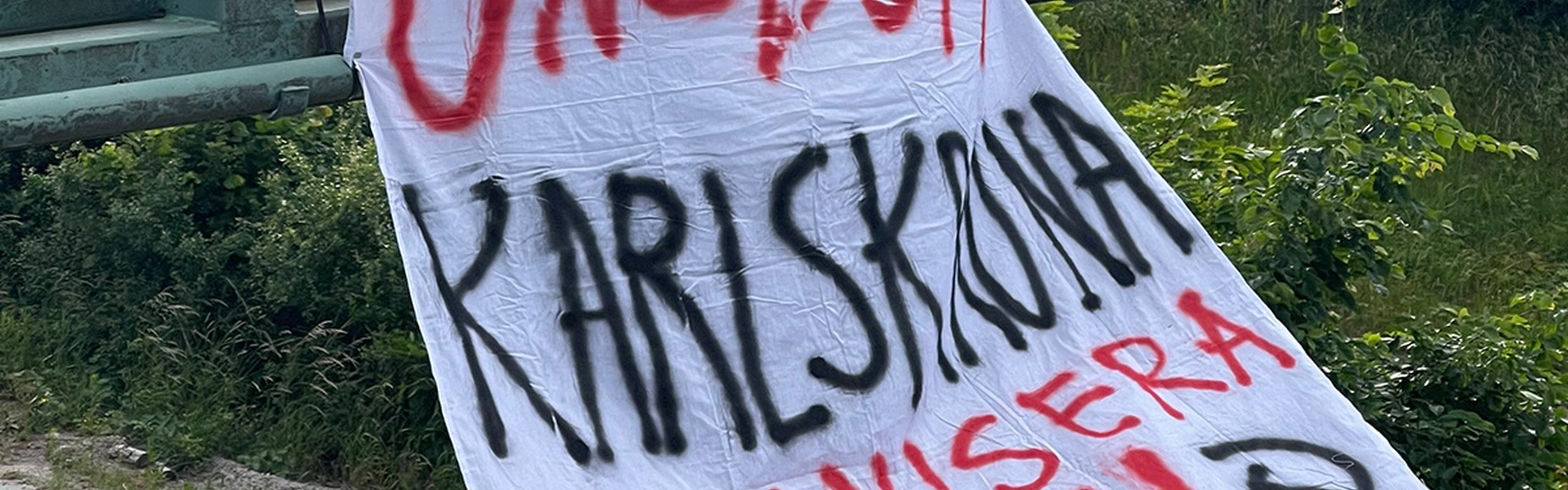 Banderoll med texten "RKU Karlskrona Organisera dig!"