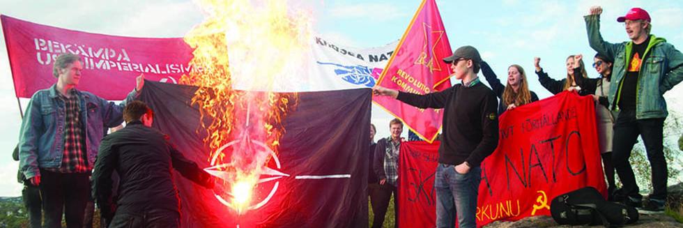 Flaggbränning vid motdemonstration mot Nato
